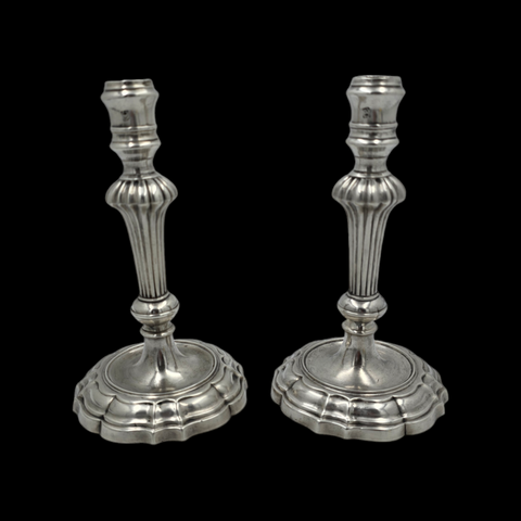 Pair of 18th century solid silver candlesticks