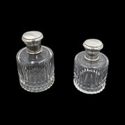 Two Antique Crystal and Sterling Silver Perfume Bottles